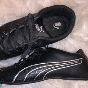 Black Puma sneakers